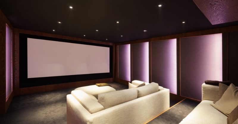 Home Theater set up sofas and screen